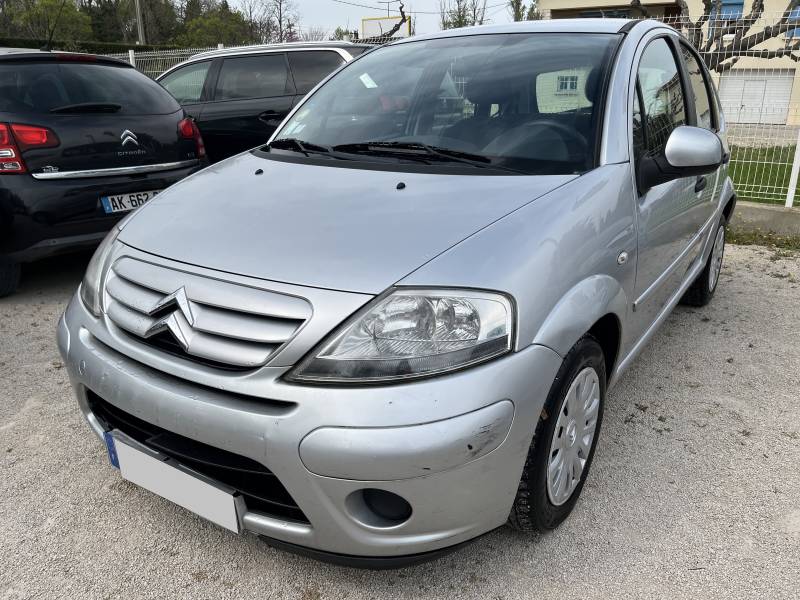 Voiture d’occasion C3 I Ph2 1.4 HDI 70 Confort. 5p. Garantie 12 Mois avec climatisation et radio CD MP3 commande au volant. Garantie 12 Mois.