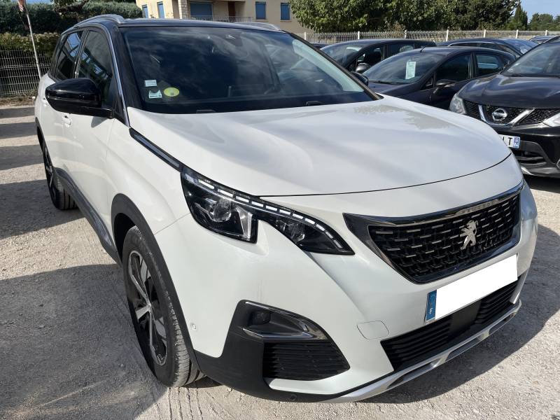 Voiture d’occasion PEUGEOT 5008 II 1.5 BLUE HDI 130 Allure Business. EAT 8. 7P. 1ère Main. avec GPS Europe tactile et Chargeur à Induction ainsi que Pack Drive Assist. Garantie 12 Mois.