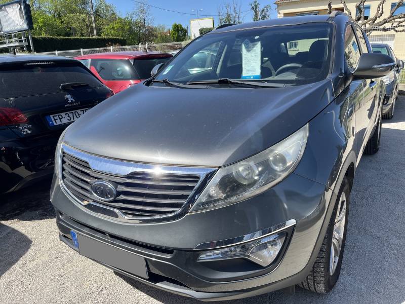 Véhicule d’Occasion KIA Sportage III 1.7 CRDI 115 Active. 2 WD. 5p. avec GPS Europe et Caméra AV + AR et Radars de Recul. Garantie 12 Mois.