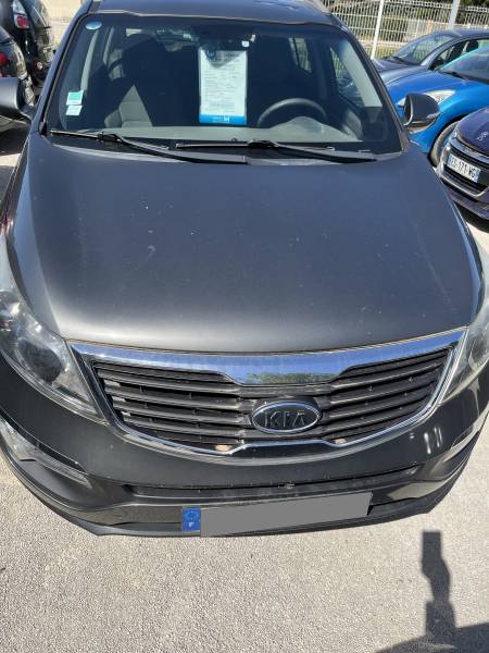 Véhicule d’Occasion KIA Sportage III 1.7 CRDI 115 Active. 2 WD. 5p. avec GPS Europe et Caméra AV + AR et Radars de Recul. Garantie 12 Mois.