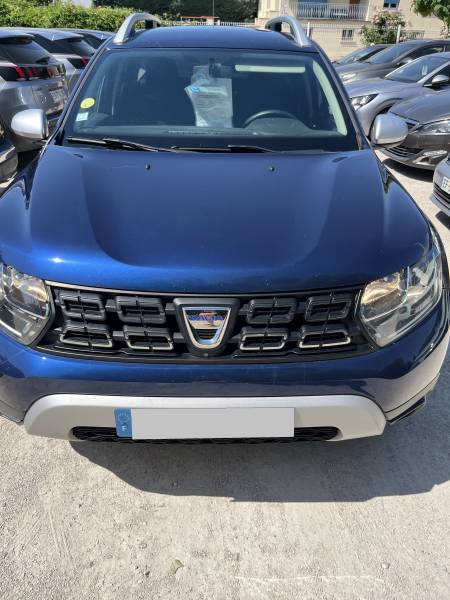 Voiture d’occasion DACIA DUSTER I Ph2 1.5 Blue DCI 116 Prestige. BV6. 5p. Avec GPS Europe tactile et Radars AV + AR + Caméra de Recul ainsi que Crochet d’Attelage AR. Garantie 12 Mois.