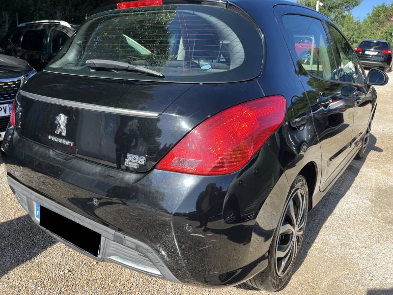 Voiture d’occasion PEUGEOT 308 I Ph2 1.6 e-HDI 112 Business Pack. BV6. 5p. avec climatisation automatique bizone et Radar de Recul ainsi que régulateur limiteur de vitesse. Garantie 12 Mois.