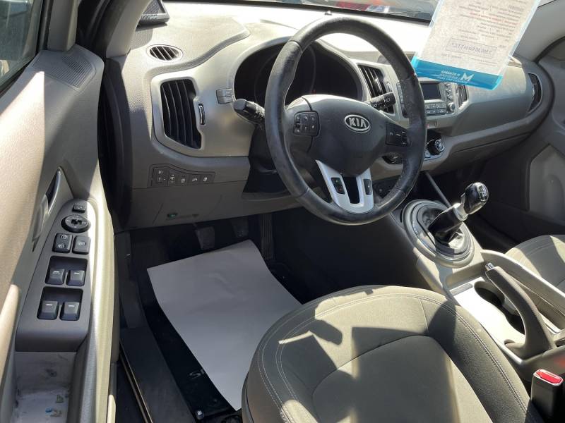 Véhicule d’Occasion KIA Sportage III 1.7 CRDI 115 Active. 2 WD. 5p. avec GPS Europe et Caméra AV + AR et Radars de Recul. Garantie 12 Mois.